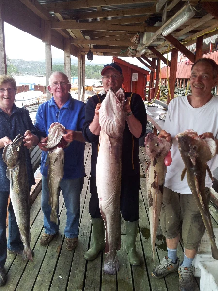 Unsere glücklichen Angler zum Ferienhaus Sotra Rorbusenter Appartement 2